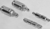 Figure 6. For millimetre-wave applications, the most common connector savers will have female connectors on both ends. Shown here are adaptors to connect an analyser with 2,4 mm front panel connectors to type N and 2,4 mm accessories